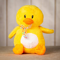 12" sitting yellow duck with polka dot bow