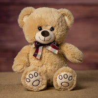 A beige bear that is 13 inches tall while standing