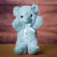 A blue bear that is 14 inches tall while standing