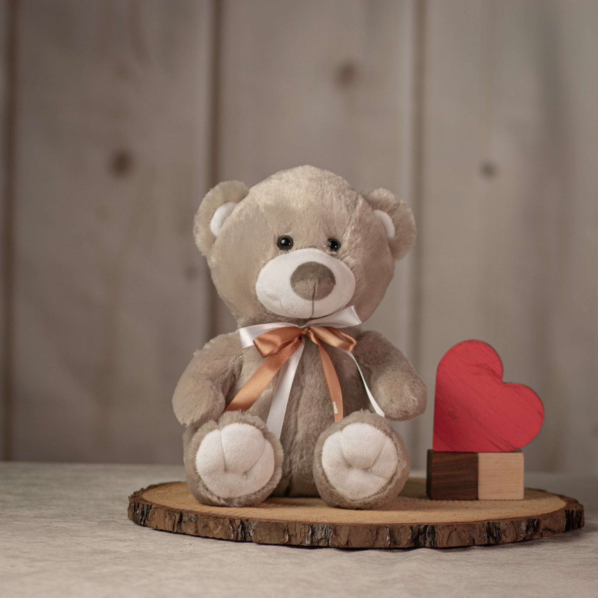 10" grey teddy bear with brown and white bow