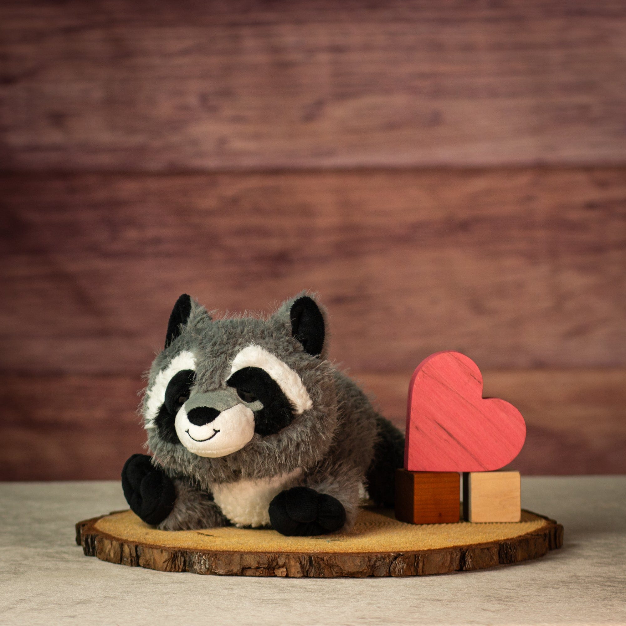 12" Laying Midnight Mask Raccoon