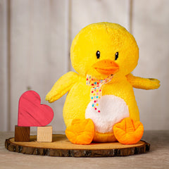 12" sitting yellow duck with polka dot bow