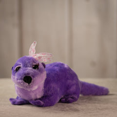18 inch purple otter with a pink polka dotted bow.