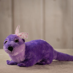 18 inch purple otter with a pink polka dotted bow.