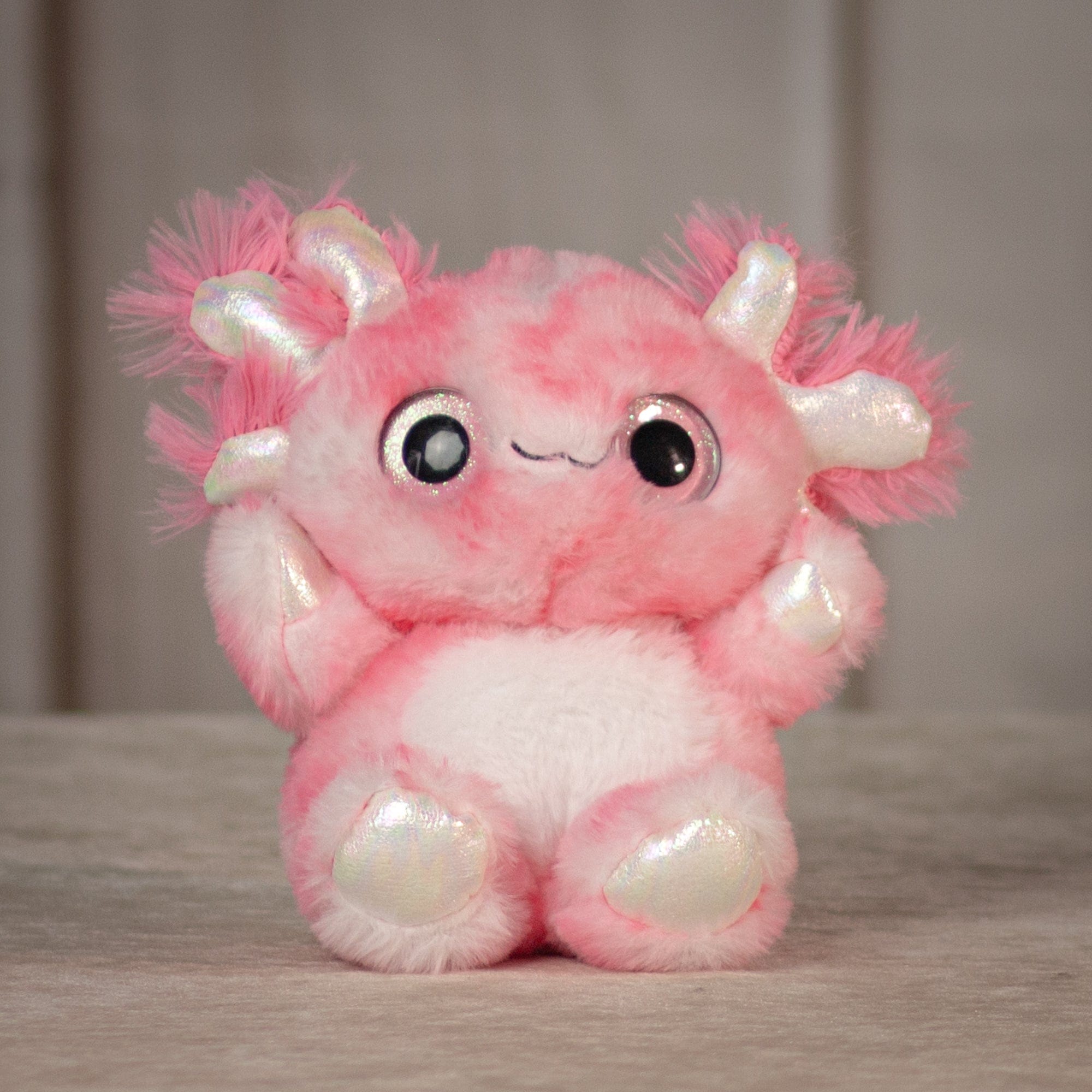 6.5" Dazzle Animal Assortment pink axoltle with pink sparkly eyes and transparent detailing