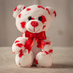 White 7.5 inch bear covered in red hearts