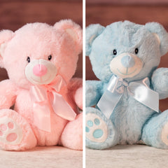 9 in stuffed pink and blue baby bear wearing a bow