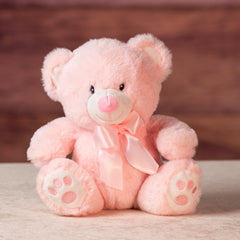 9 in stuffed pink baby bear wearing a bow