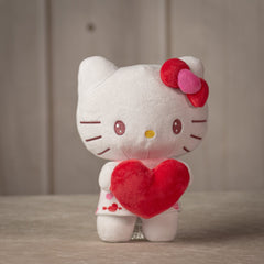 9 inch Valentine Hello Kitty with a red bow holding a stuffed red heart