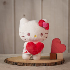 9 inch Valentine Hello Kitty with a red bow holding a stuffed red heart