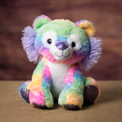 A rainbow lion that is 10 inches tall while sitting