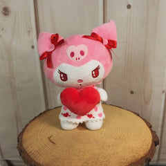 9" Hello Kitty Valentine Kuromi stuffed animal with red bows on its ears and holding a stuffed heart