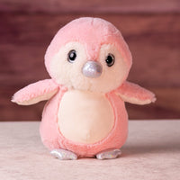 10 in stuffed pink penguin with glitter eyes and glitter ears and paws