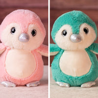10 in stuffed pink and blue penguin with glitter eyes and glitter ears and paws