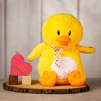 12" sitting yellow duck with polka dot bow