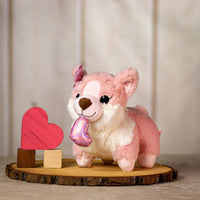 9.5" stuffed valentine pink corgi dog wearing a bow and holding a heart