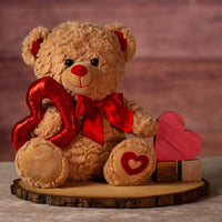 12 in stuffed brown valentine bear holding a sequin heart and wearing bow