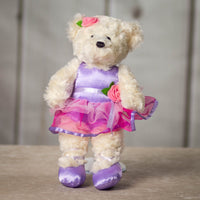 14" stuffed cream ballerina bear wearing a pink and purple leotard and tutu with a pink rose and purple ballet flats