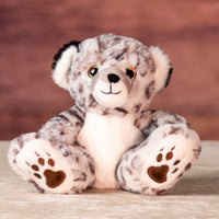 6.5 in stuffed snow leopard with rainbow eyes