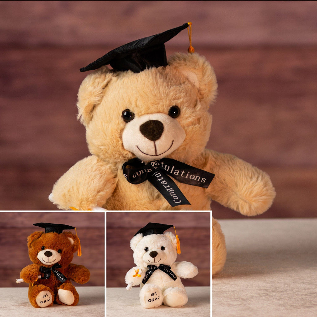 9 in graduation bear in cap, celebratory bow and diploma