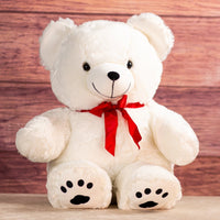 28 in large stuffed white bear wearing a red bow