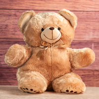 28 in large stuffed light brown bear wearing a tan bow