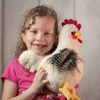 girl holding 10" White Chicken with feathered wings