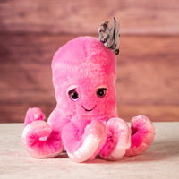 8 inch Pink octopus with eyelashes and wearing a bow