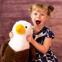 girl holding 17 in stuffed eagle