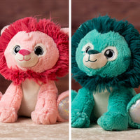 10 in stuffed pink and blue lion with glitter eyes and glitter ears and paws