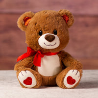 9 in stuffed brown valentines bear with glitter ears and heart paws and wearing a bow