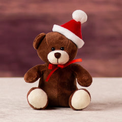 A brown bear that is 5.5 inches tall while sitting