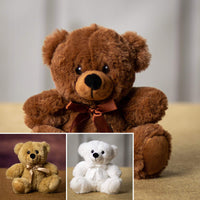 A white. beige, and brown bear that are 6 inches tall while sitting