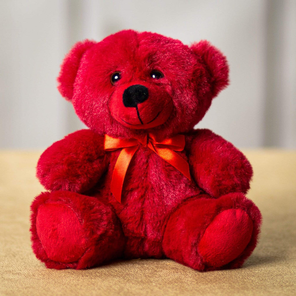 A red bear that is 6 inches tall while sitting