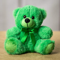 A green bear that is 6 inches tall while sitting