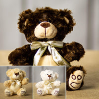 A beige, cream and brown bear that are 7 inches tall while sitting