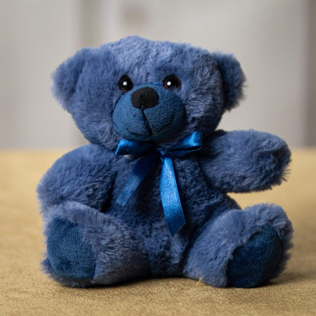 A blue bear that is 6 inches tall while sitting