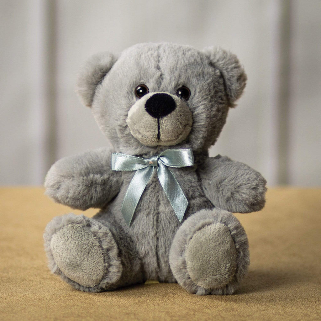 A gray bear that is 6 inches tall while sitting