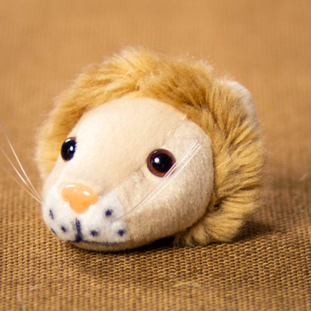 A beige lions head that is 3 inches from top to bottom