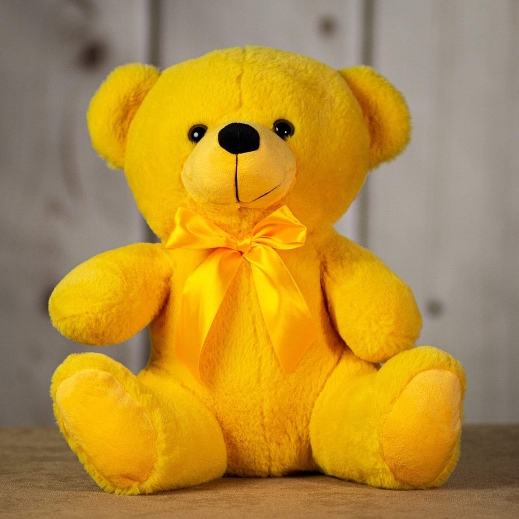 A yellow bear that's 14 inches tall while sitting