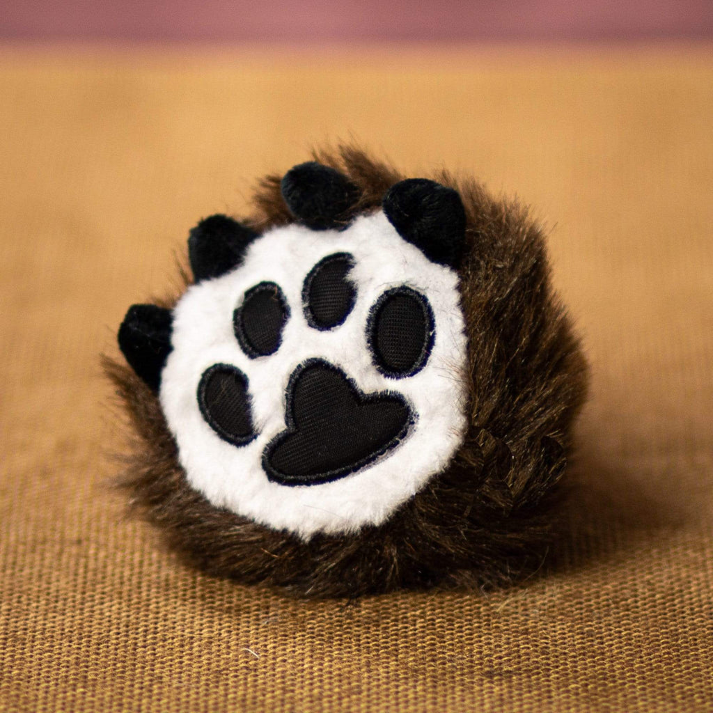 A brown paw claw that is 4 inches tall from top to bottom