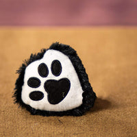 A black paw print that is 4 inches tall from top to bottom