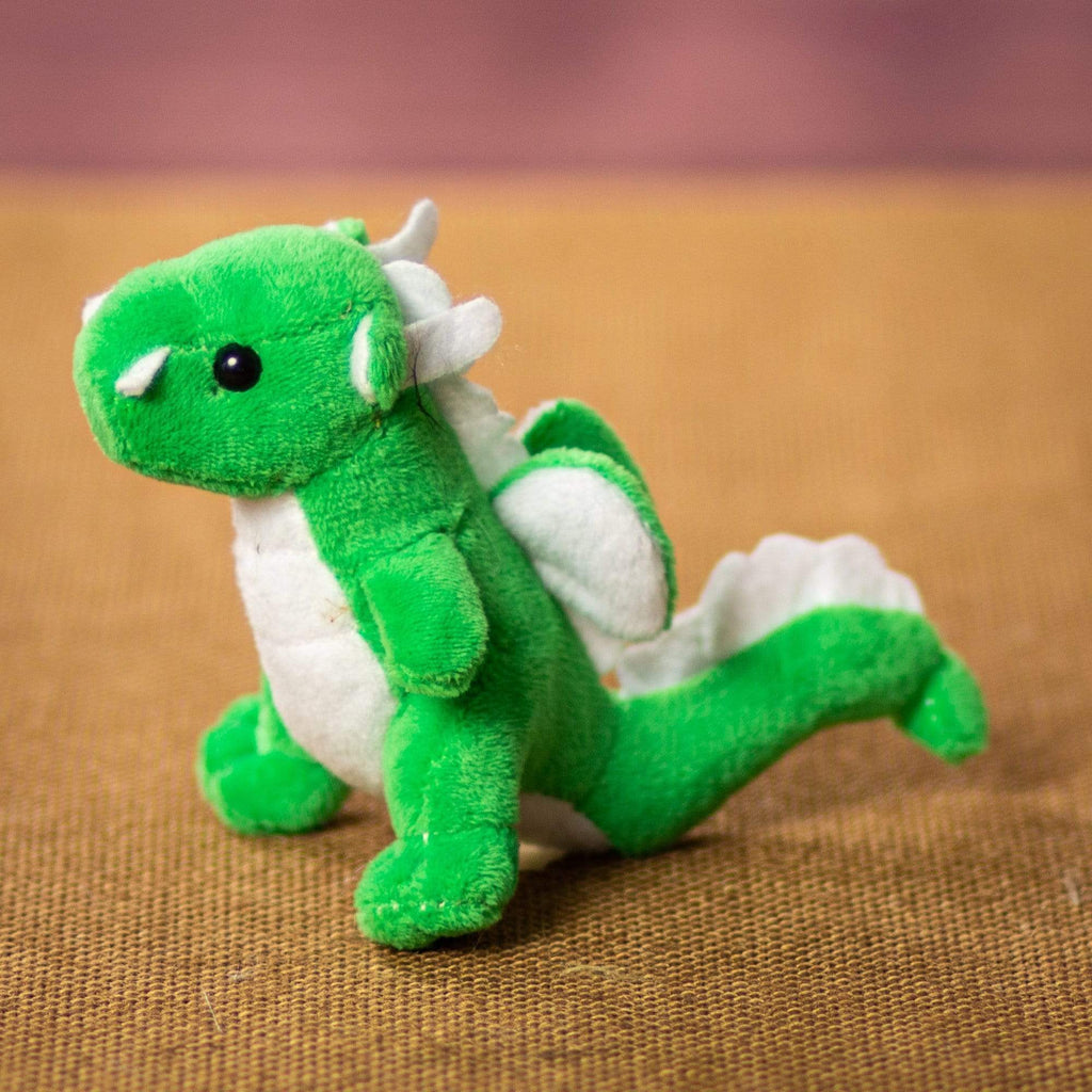 A green dragon that is 4 inches tall while standing