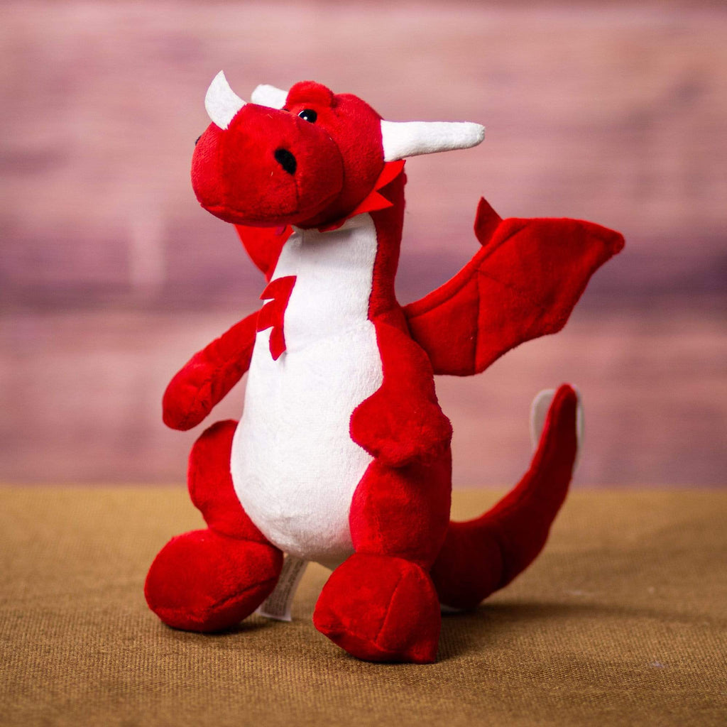 A red dragon that is 10 inches tall while sitting