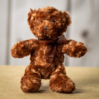 A brown bear that is 10 inches tall while standing