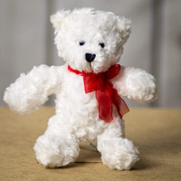 A white bear that is 10 inches tall while standing