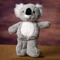 A grey koala that is 11 inches tall while standing
