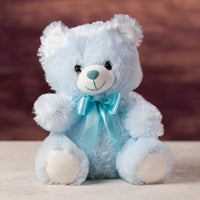 A blue bear that is 10 inches tall while sitting