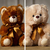 Two bears, beige and brown side by side