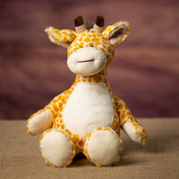A giraffe that is 13 inches tall while standing